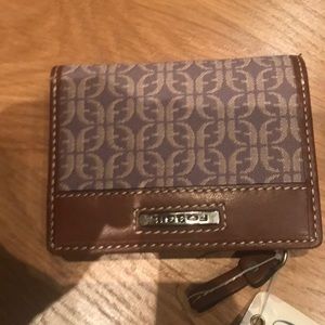 Fossil 4 inch x 3 inch monogram wallet. Brand new